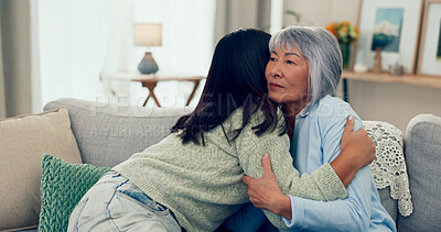 Buy stock photo Love, hug and mother with adult daughter, affection and bonding together in living room. Apartment, mama and girl in lounge, embrace and parent with comfort, home and support with family and empathy