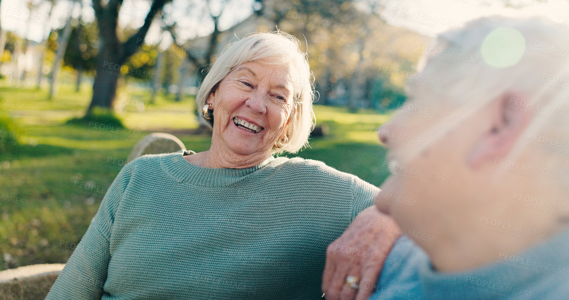 Buy stock photo Friends, laugh and elderly women in park for bonding, conversation and relax together outdoors. Happy, retirement and senior people talking on bench for wellness, chatting and discussion in nature