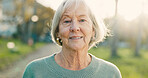 Elderly, woman and smile in portrait outdoor for morning walk, wellness and confidence in retirement. Senior person, face of pensioner and happy in nature for relax, fresh air and pride in park