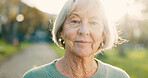 Senior, woman and smile in portrait outdoor for morning walk, wellness and confidence in retirement. Elderly person, face of pensioner and happy in nature for relax, fresh air and pride in street