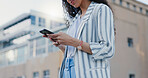 Travel, phone and hands of woman in city typing for social media, networking and communication. Outdoor, urban town and person on smartphone for online chat, internet and website in street on weekend