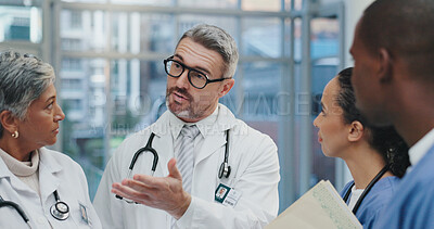 Buy stock photo Meeting, discussion and doctors in hospital with clipboard, tablet and advice for schedule in lobby. Group, men and women together in healthcare for planning, consulting and medical team in clinic