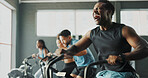 Activity, exercise bike and training with people in gym together for cardio or intense workout. Elliptical machine, fitness and power with athlete group in health club for challenge or performance