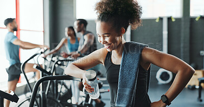 Buy stock photo Fitness, smile and water with woman in gym for hydration on break from training or workout. Exercise, sports and thinking with happy athlete person in health club for challenge or performance