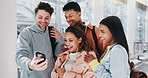 Group, students and laughing with phone at school for funny meme, social media and reading comic blog. Happy, people and mobile for education news, campus gossip and streaming video at university