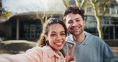 Buy stock photo Happy couple, students and selfie with peace sign for picture, photography or memory at campus. Young, man and woman with smile, emoji or gesture for moment, capture or friendship at university