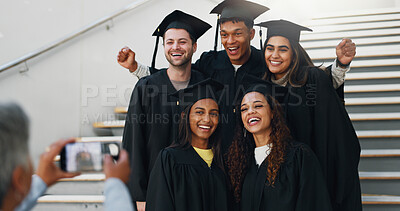 Buy stock photo Friends, graduation or excited on campus for photography, support or smile for achievement. Students, class or happy at stairs for event, academic success or taking picture for yearbook or local news