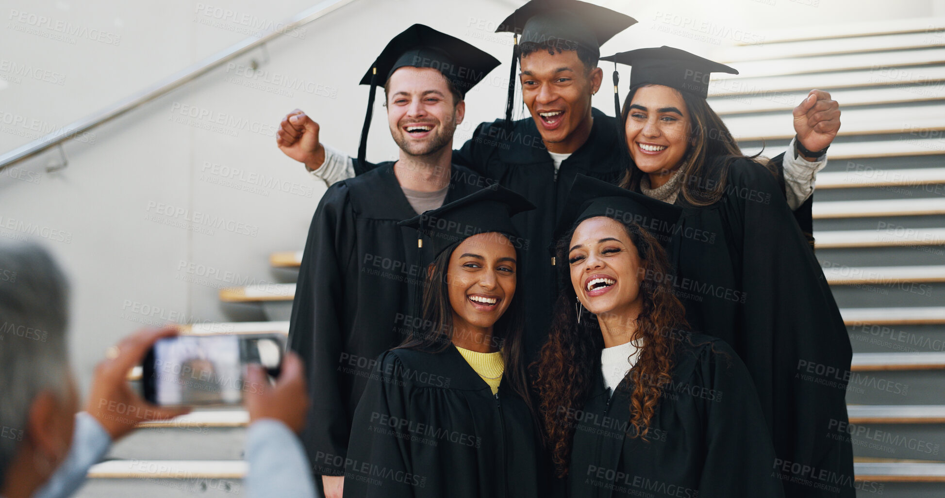 Buy stock photo Friends, graduation or excited on campus for photography, support or smile for achievement. Students, class or happy at stairs for event, academic success or taking picture for yearbook or local news