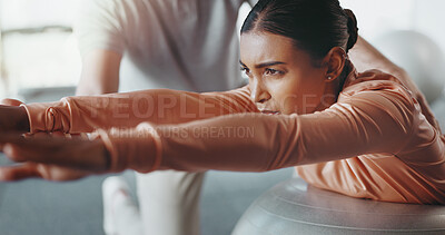 Buy stock photo Ball, woman and personal trainer in gym for challenge, rehabilitation and balance training. Girl, person and physiotherapy in fitness center for core strength, practice and help in active exercise