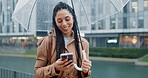 Smile, woman and phone with umbrella for rain weather, communication and social media of security. Happy, female person and mobile for texting contact, search location and taxi app of travel outdoor