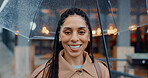 Portrait, rain or happy woman with umbrella outdoor for travel or security in Africa. Face, smile or person with parasol in city for wet winter weather or business insurance cover with agent in Kenya