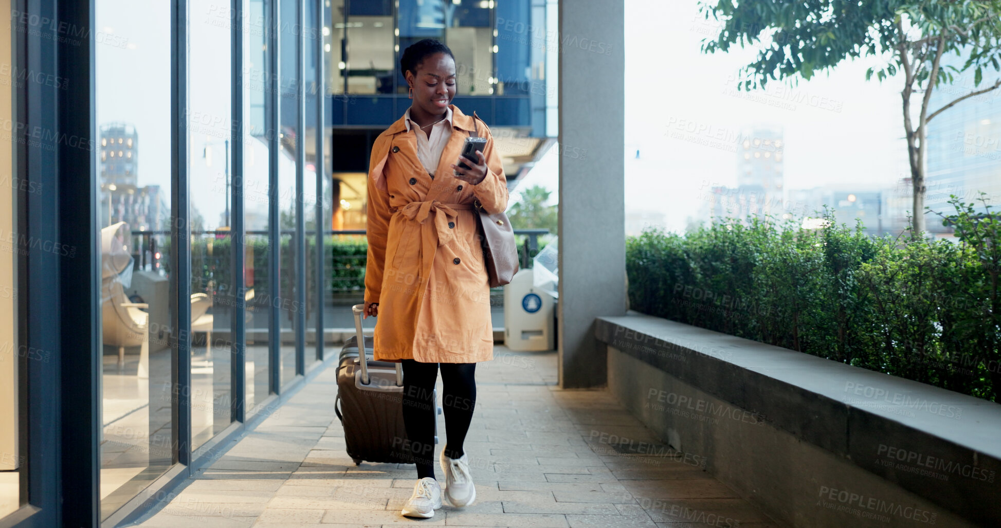 Buy stock photo Phone, night and suitcase with black woman in city for communication, travel or technology. Chief automation office, ai engineer and rpa software with person and mobile for hackathon expo or seminar