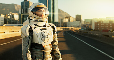 Buy stock photo Thinking, woman and astronaut in city highway for survival, planet dystopia and spacesuit of aerospace mission. Earth. person and view for emergency safety, sci fi journey or adventure of urban world