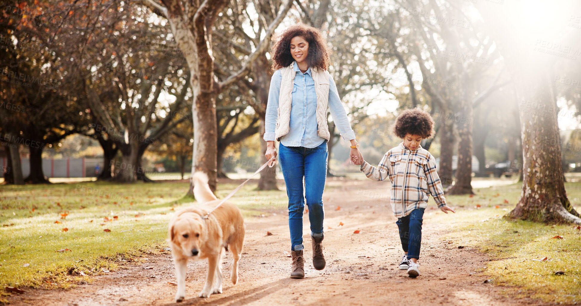 Buy stock photo Walking, dog and mother in park, boy and bonding together with wellness, fitness and nature. Outdoor, parent and holding hands with son, mama or pet lover with happiness, cheerful and joy with leash