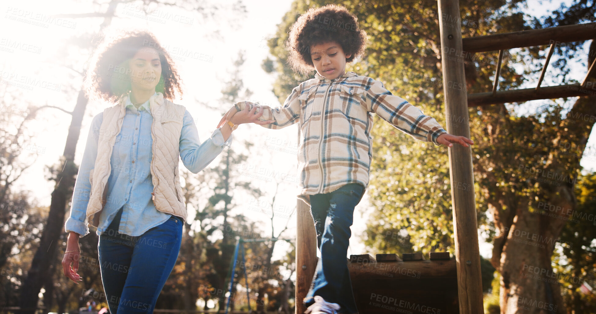 Buy stock photo Holding hands, mother and boy in park, game and bonding together with happiness, cheerful and family. Outdoor, single parent and mama with toddler, playground and joyful with trees, nature and son