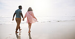 Love, holding hands and back with couple at beach for travel destination, summer and honeymoon vacation. Relax, tropical and adventure with woman on date for holiday, bonding and romance together