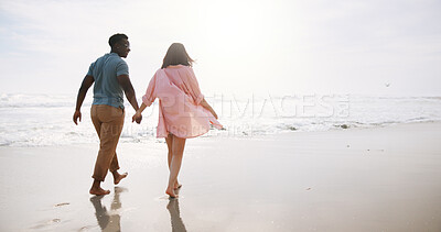 Buy stock photo Love, holding hands and back with couple at beach for travel destination, summer and honeymoon vacation. Relax, tropical and adventure with woman on date for holiday, bonding and romance together