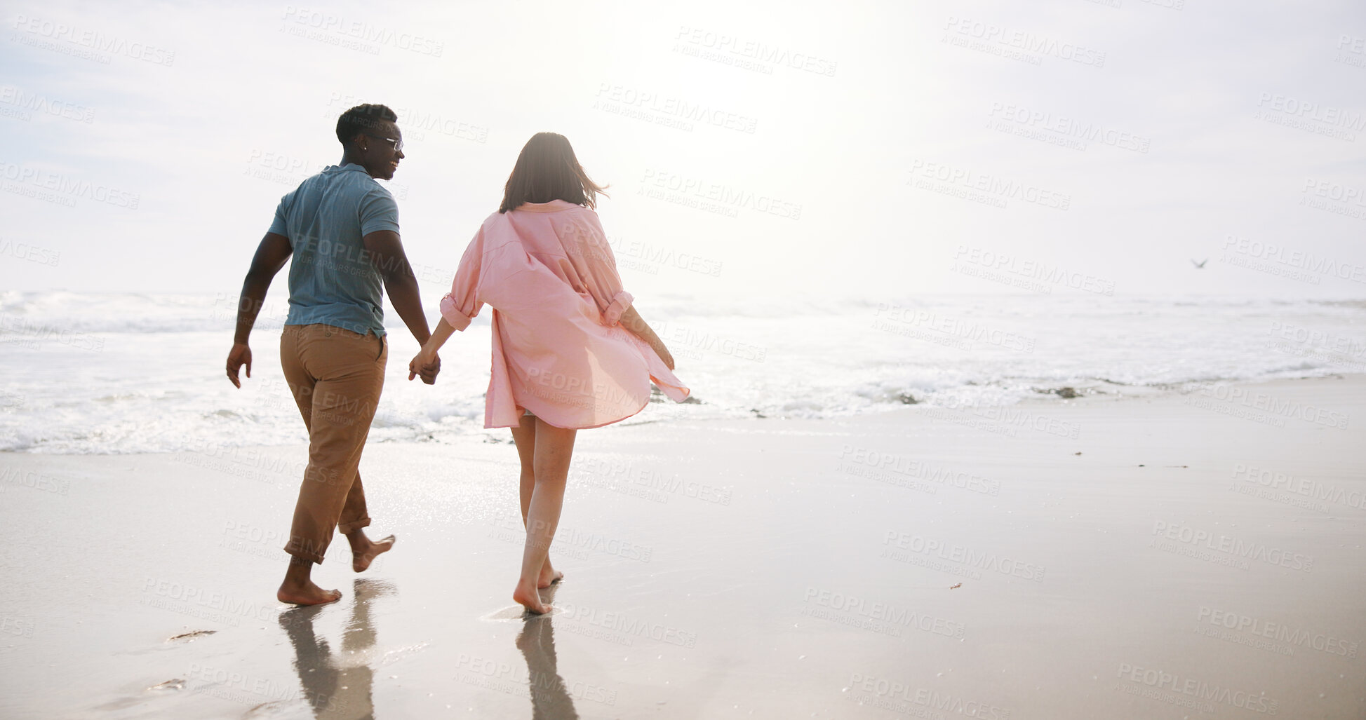 Buy stock photo Love, holding hands and back with couple at beach for travel destination, summer and honeymoon vacation. Relax, tropical and adventure with woman on date for holiday, bonding and romance together