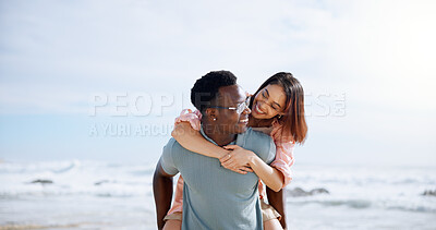 Buy stock photo Love, piggyback and happy with interracial couple at beach for travel destination, summer and honeymoon vacation. Relax, tropical and adventure with man and woman for holiday, bonding or romance