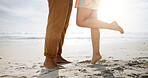 Feet, sand and couple at the sea for beach holiday and summer vacation with travel by ocean. Hawaii, together and tropical with water and people legs on an island with freedom and sunshine outdoor