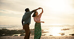 Couple, sunset and dance on beach for love, summer vacation and holiday for celebration. Man, woman and holding hands at seaside for movement, engagement and commitment in relationship in Mauritius