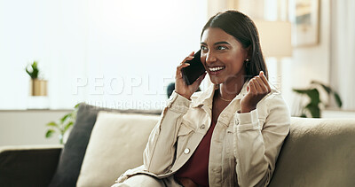 Buy stock photo Conversation, phone call and smile with Indian woman on sofa in living room of home for communication. Contact, relax or wellness and happy person talking with mobile for networking in apartment