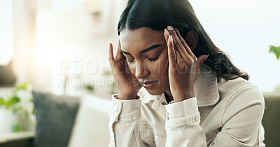 Buy stock photo Indian woman, stress and headache in home for pain, burnout and depression on sofa with head massage. Female person, sad and anxiety in apartment for mental health, fatigue or migraine with brain fog