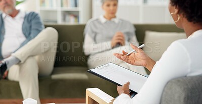 Buy stock photo Therapy, writing and couple on sofa for counseling session, consulting and advice in office. Psychology, meeting and man and woman on couch for marriage, relationship and communication with notes