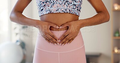 Buy stock photo Woman, heart and hands on stomach for fitness, wellness or body care in home. Love, abdomen or girl with sign for digestion, gut health and show progress of keto diet or detox for weight loss results