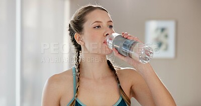 Buy stock photo Home, woman and drink water for hydration after yoga, practice and mindfulness session for wellness. Fitness, female person and yogi on break with beverage bottle, liquid and thirst with mineral H2O