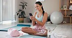 Yoga, happy and woman with phone in home for social media, online message and internet. Happy, pilates and person on smartphone for exercise, training and workout for wellness, health and progress