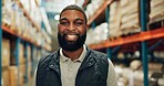 Portrait, black man and smile at warehouse for distribution service, logistics industry and package inventory. Worker, happy and inspection for supply chain, freight and quality control of production