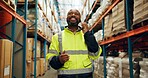 Logistics, black man and phone call at warehouse for distribution, inspection and package inventory. Male person, mobile and discussion for order storage, quality control and supply of stock at depot