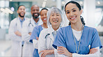 Medical, people and portrait with arms crossed in hospital for healthcare service, unity and pride. Workers, diversity and nurses with doctors with smile for solidarity, trust or confidence at clinic