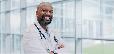 Buy stock photo Black man, doctor and confident in hospital for portrait, healthcare and smile for career path. Mature cardiologist, arms crossed and happy in lobby for service, medical expertise and pride in Kenya