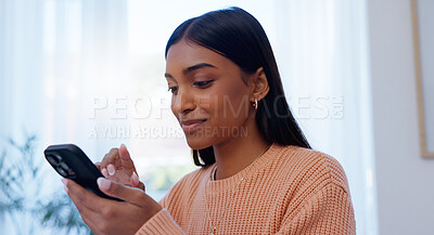 Buy stock photo Home, Indian woman and notification with smartphone for chat, text message and communication with contact. House, female person or cellphone with mobile app for scroll, share reel or relax with smile