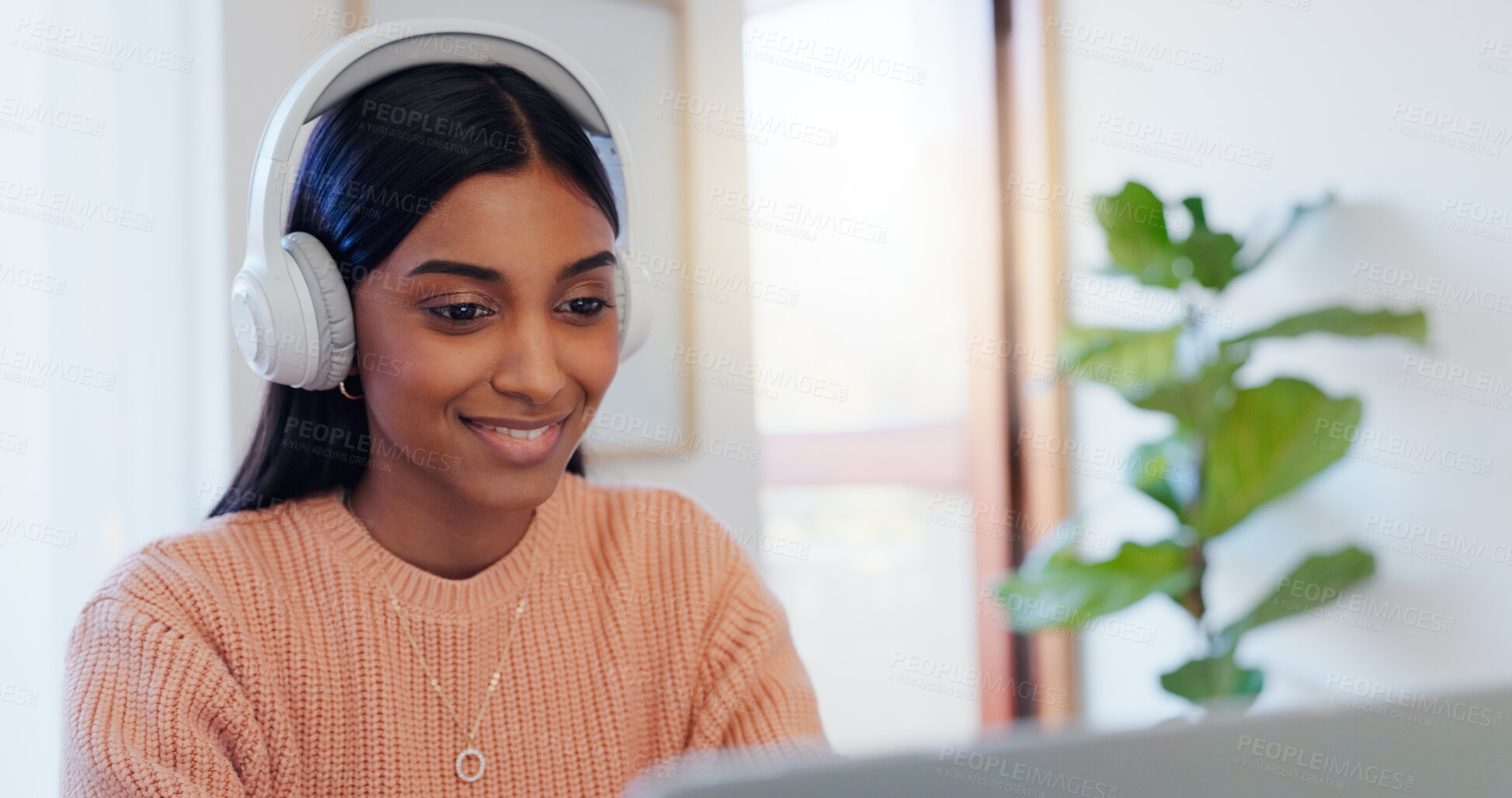 Buy stock photo Indian woman, remote work and laptop with headphones for listening, hearing and editing online audio. Freelancer, female  person or video editor with digital for creative process, sound and satisfied