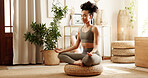 Home, yoga and woman with meditation, lotus and peace with chakra, spiritual routine and fitness. Apartment, healthy person and girl with balance, wellness or posture with exercise and calm in lounge