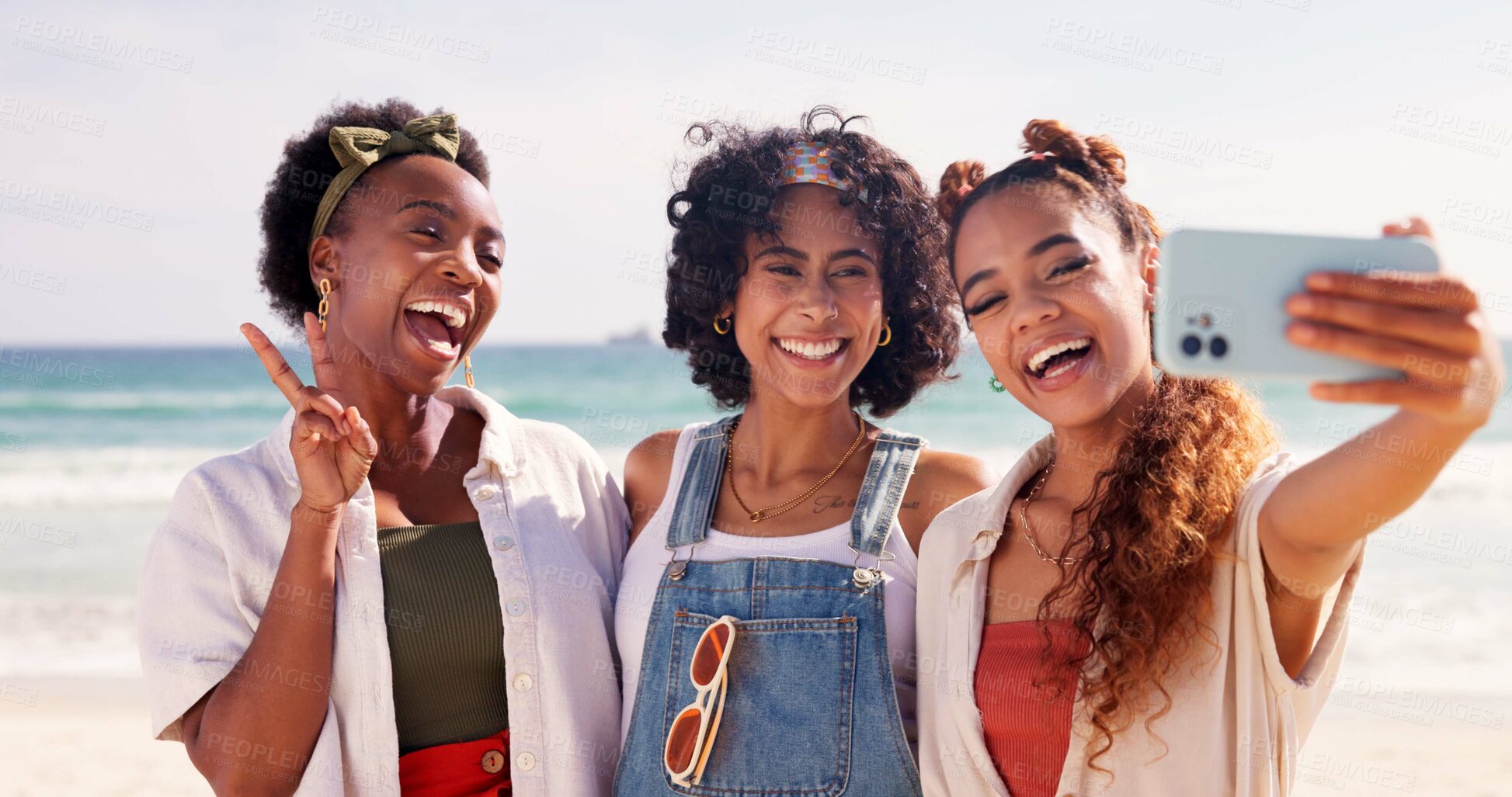 Buy stock photo Happy women, friends and beach with peace sign for selfie, holiday or summer vacation together in nature. Young, group or female person with smile, hug or emoji for picture or memory by ocean coast