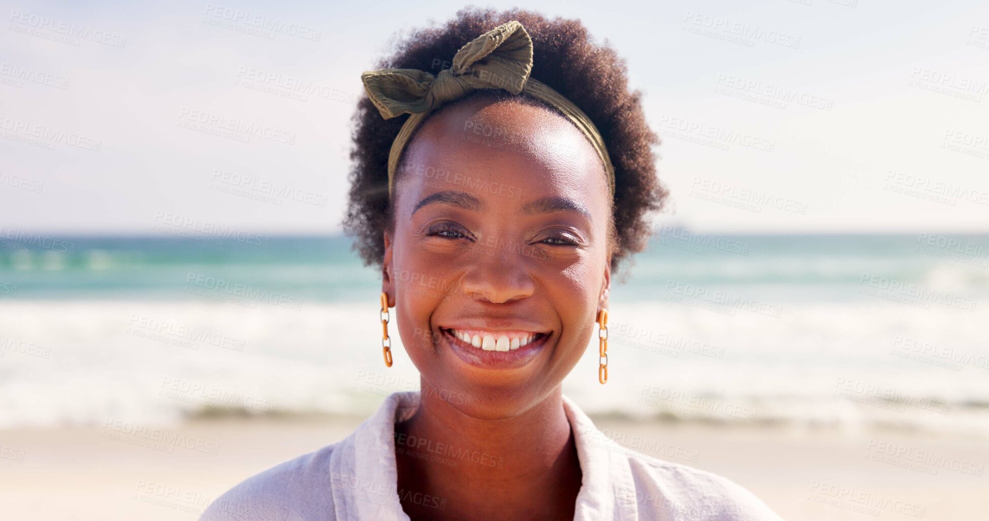 Buy stock photo Happy, relax and portrait of black woman at beach for summer vacation, holiday and weekend in nature. Travel, smile and face of person by ocean, sea and outdoors for tourist adventure in Tanzania