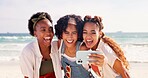 Happy women, friends and laughing with selfie at beach for funny holiday or summer vacation together. Young, group or female person with smile, hug or humor for picture, memory or moment by ocean