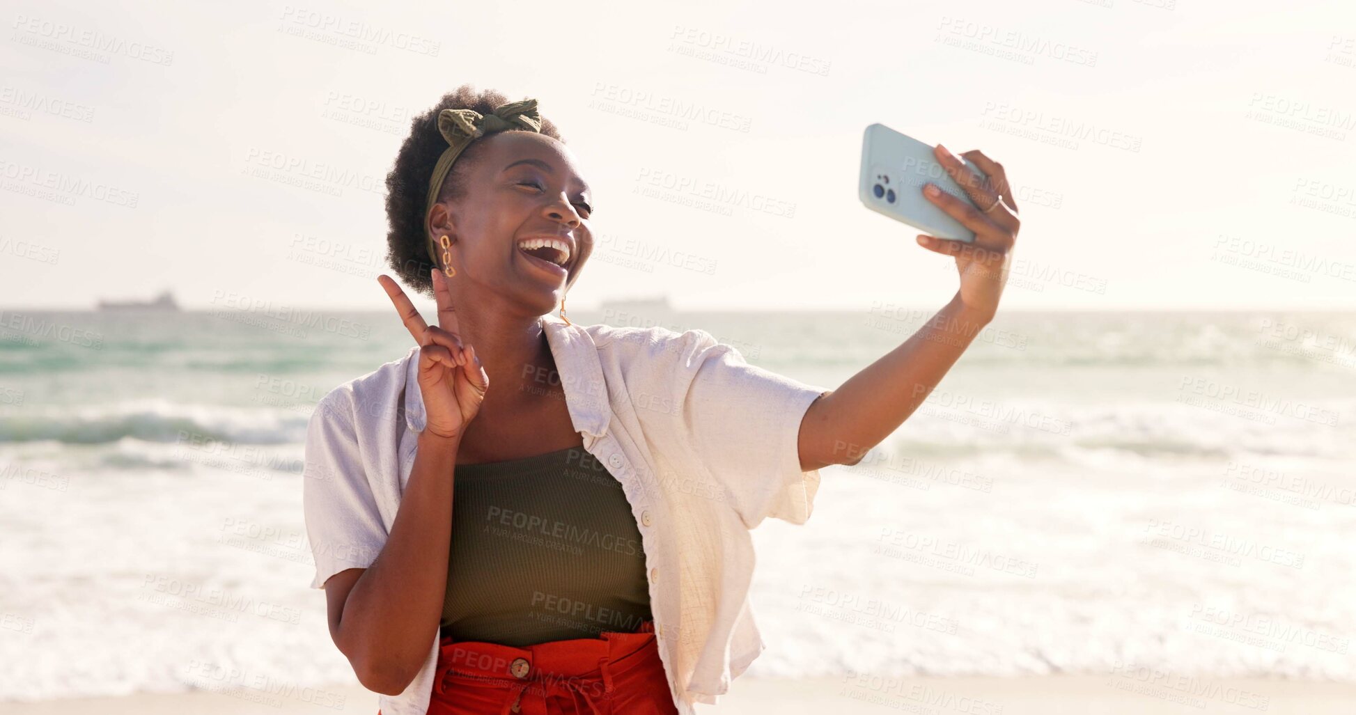 Buy stock photo Happy, black woman and beach with peace sign for selfie, memory or photography in nature. Young African, female person or hipster with smile for picture, moment or holiday vacation by ocean coast