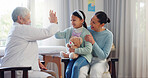 Pediatrician, child and mom at consultation with high five of mature woman and teddy with health check. Smile, support and healthcare with motivation, young girl and wellness with family doctor