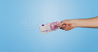 Buy stock photo Cash, euro and hand of person in studio with offer, bonus or prize giveaway for financial freedom. Money, budget and model with bills for profit, savings or salary increase on blue background space