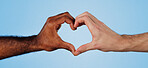 Love, sign and hands of people in studio for solidarity, diversity and collaboration together in community. Finger, emoji and team with heart icon, gesture or symbol for support on blue background