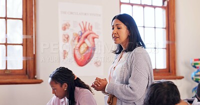 Buy stock photo Education, woman and teacher in classroom at school for teaching students biology for exam. Life science, career and female educator talking in lesson for research, notes or information with test.