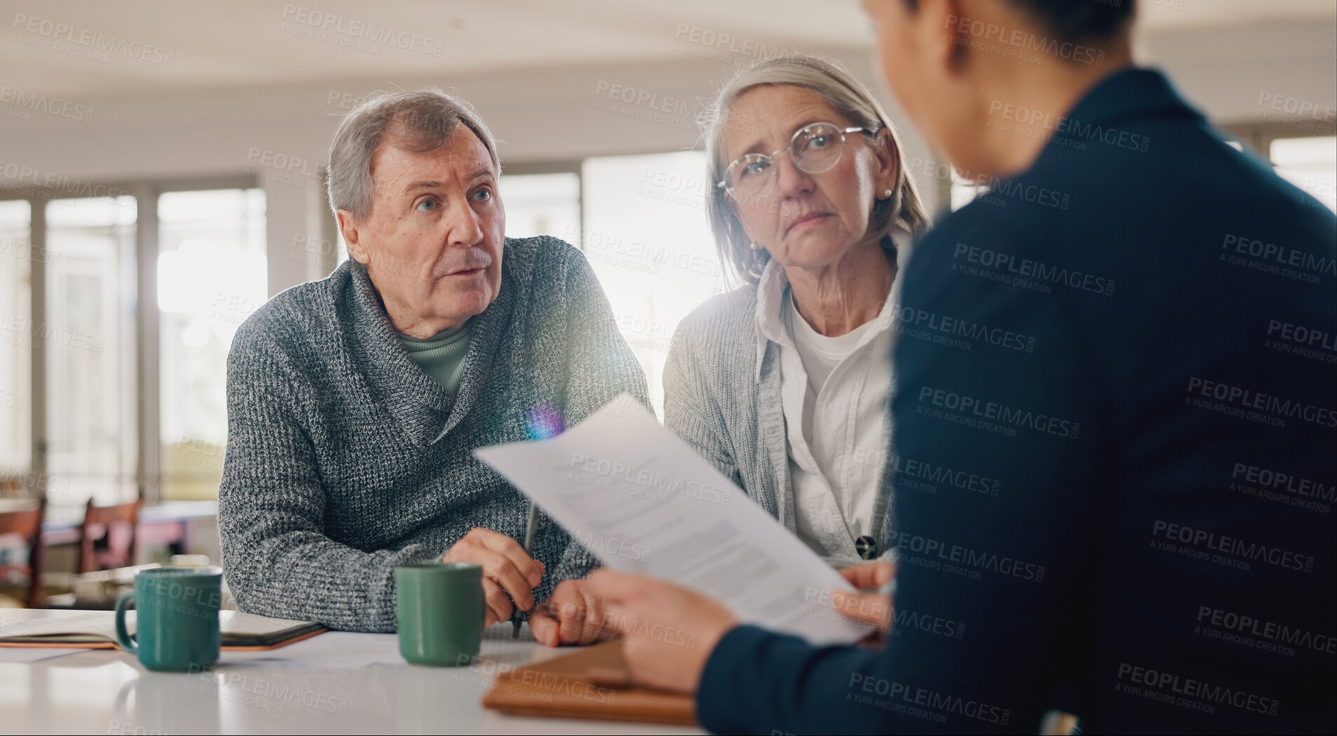 Buy stock photo Conversation, documents and senior couple with financial advisor for retirement annuity saving account. Meeting, finance paperwork and elderly man and woman with investment banker for pension growth.