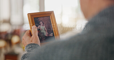 Buy stock photo Hand, memory and senior person with picture frame for mourning, loss or grief with history in house. Comfort, nostalgia and elderly patient with photo for reflection or remembrance in retirement home