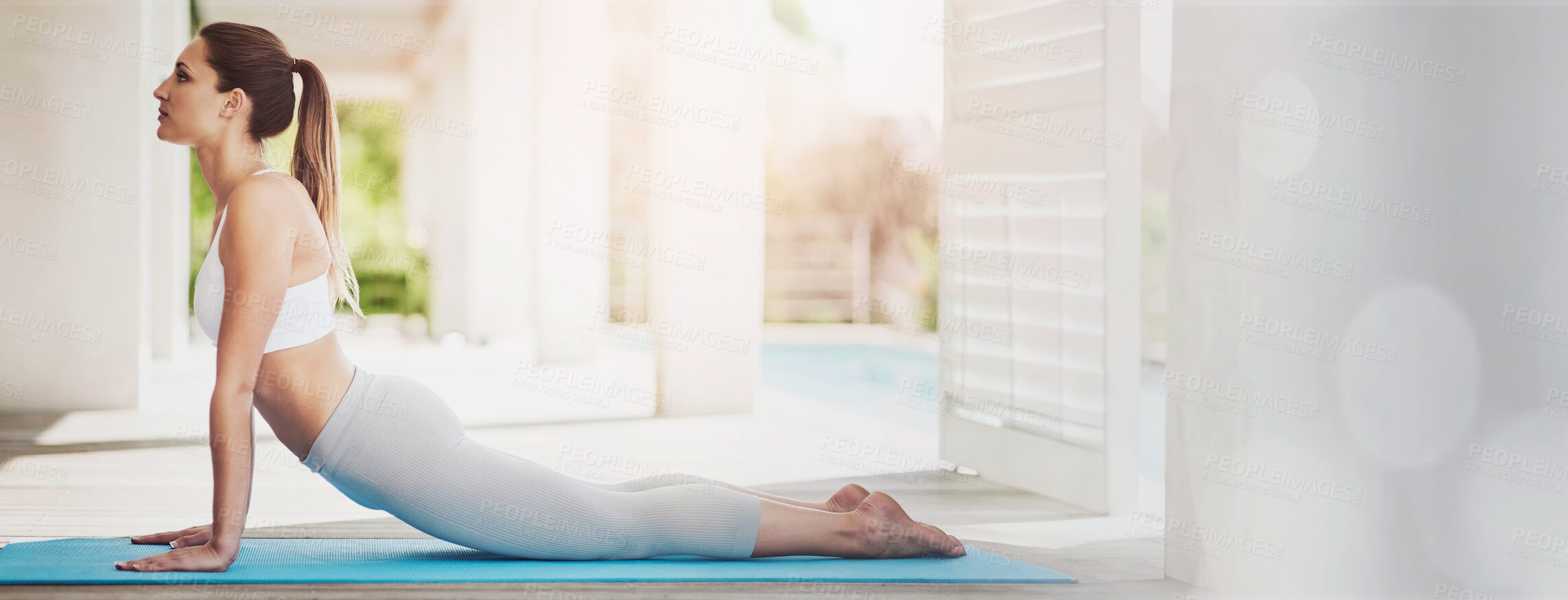 Buy stock photo Exercise, stretching and yoga with woman in home for start of holistic wellness routine on pilates mat. Balance, fitness and upward dog with yogi person in sportswear for peaceful or zen workout