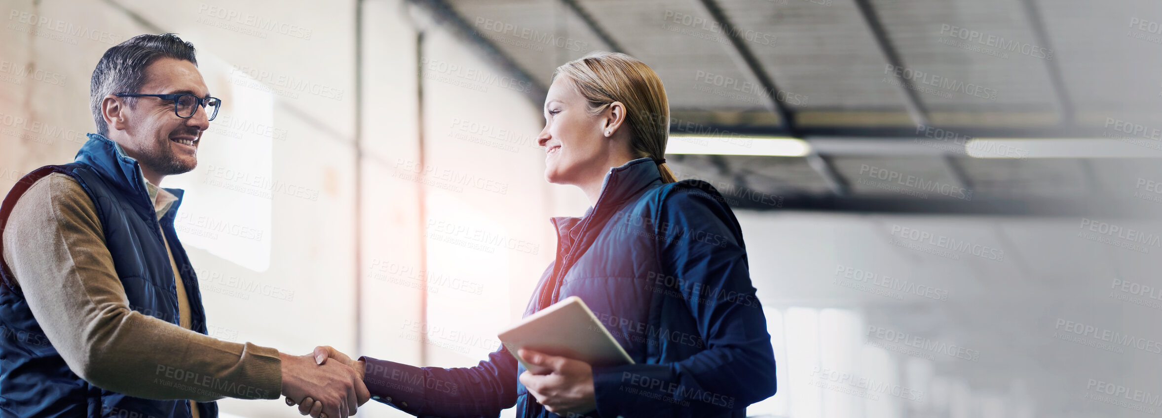 Buy stock photo Welcome, deal and business people with handshake for partnership, distribution or agreement. Professional, technology and shaking hands for export support, b2b networking or onboarding in warehouse